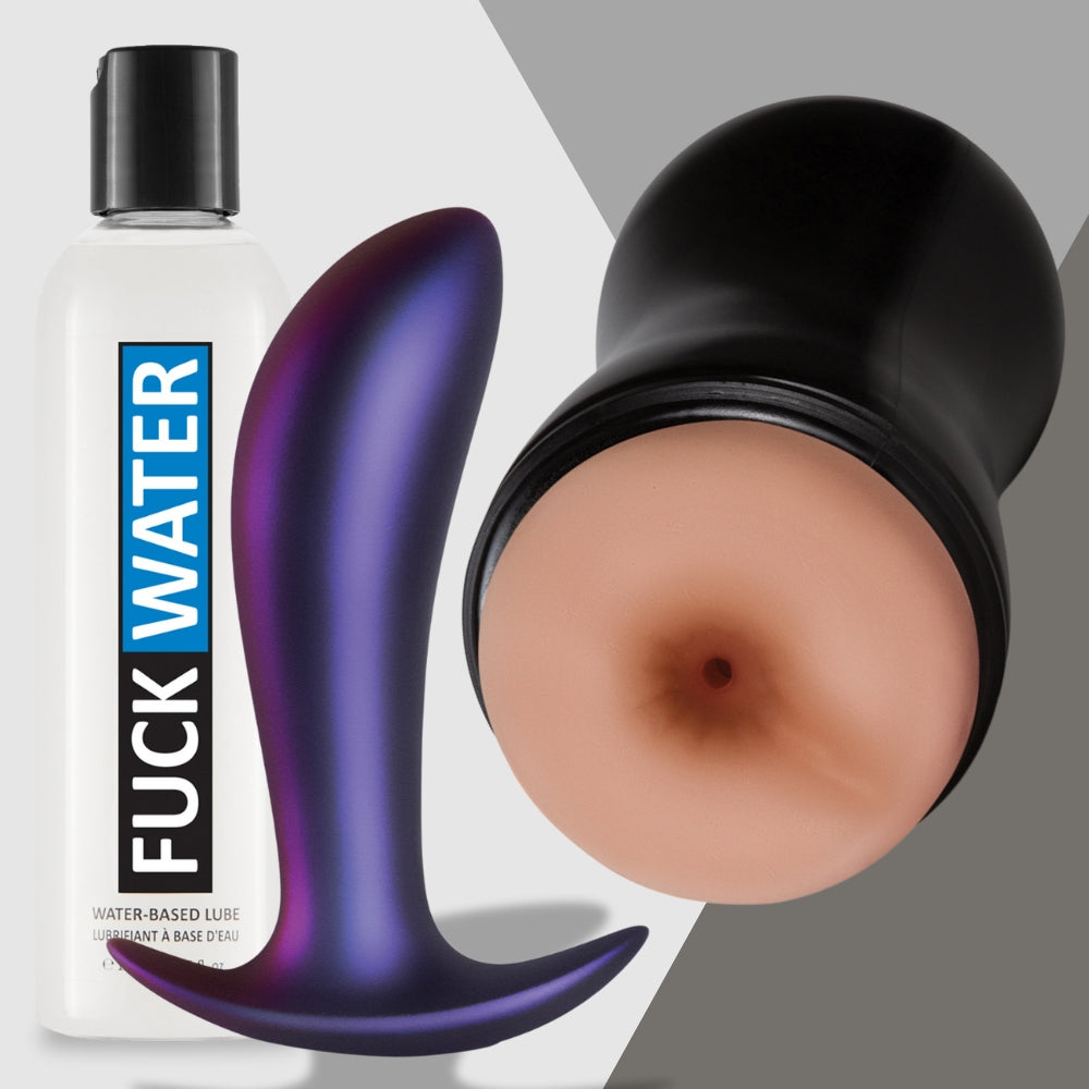 Adams Toy Box presents Quickie in a Jiffy, featuring a bottle of water-based lubricant, a purple curved adult toy, and a black case with a realistic opening, all set against a gray background for spontaneous pleasure.