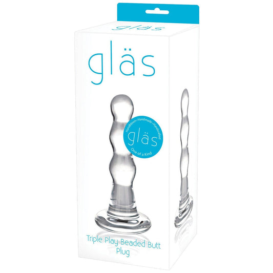 The image shows the packaging for a Glas Triple Play Beaded Butt Plug. The white box features a clear picture of the fracture-resistant, body-safe product and prominently displays the blue Gläs branding on the front.