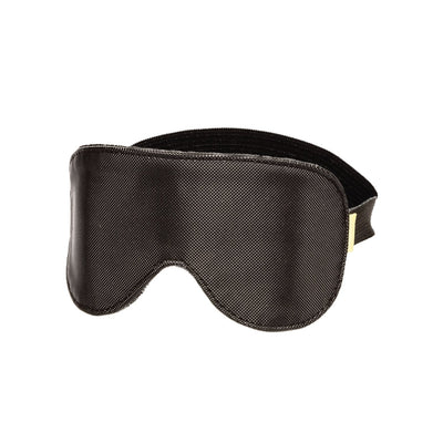 Boundless Blackout Eye Mask, a black textured vegan leather blindfold with a curved nose notch and a black elastic strap.