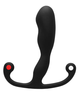 The Aneros Trident Series Helix Syn is a black prostate stimulator with a curved, ergonomic design, featuring a sculpted body and a handle marked by distinctive red and white dots.