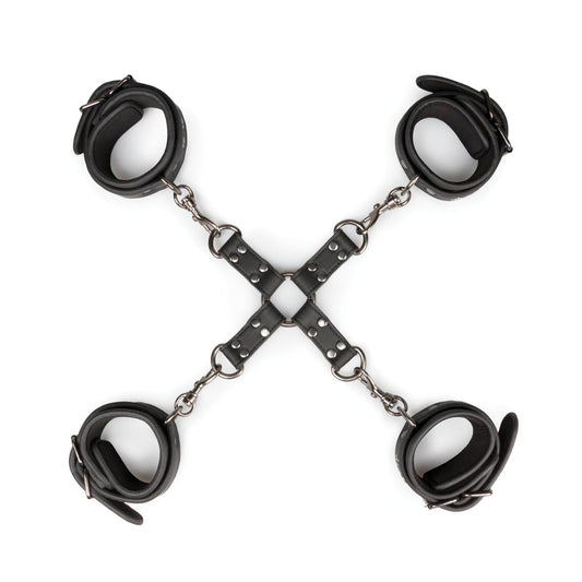 The Easy Toys Hogtie with Hand & Ankle Cuffs features sleek black faux leather cuffs connected by metal chains in an X shape on a white background, representing a sophisticated piece of bondage gear.