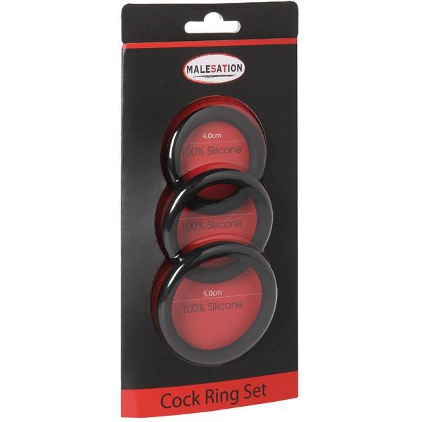 The Malesation Cock Ring Set - Pack Of 3 enhances stamina with three black silicone rings in various sizes, elegantly presented in a sleek black and red box.