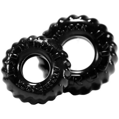 Oxballs TruckT stretchy cock ring 2 pack in black: a large and a small tire-tread ring with embossed lettering