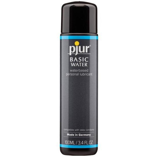 The Pjur Basic Water Based Lubricant, featuring medical-grade ingredients and a label confirming latex condom compatibility, is presented. This 100ml (3.4 fl oz) bottle is made in Germany and showcases a sleek black and blue design.