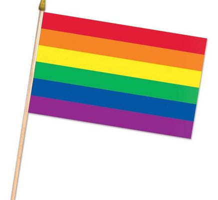 Adams Toy Box Rainbow Fabric Flag features horizontal stripes in red, orange, yellow, green, blue, and purple on a small flag attached to a wooden stick with a gold finial.