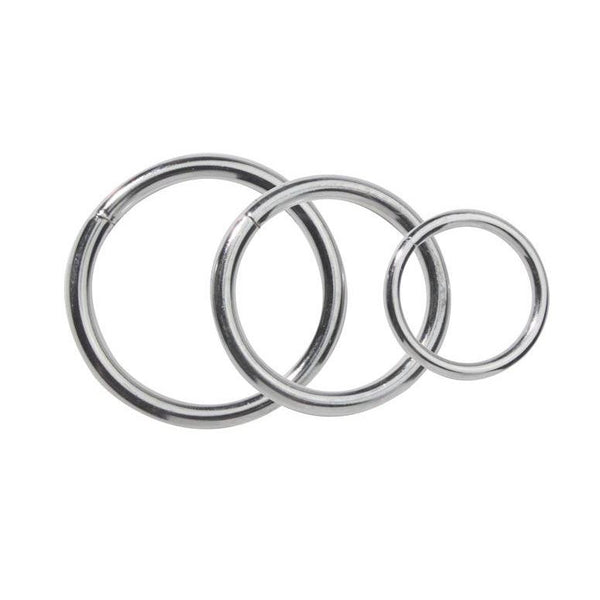 The Spartacus Metal Ring Set includes three polished metal rings of different sizes, arranged side by side from large to small.