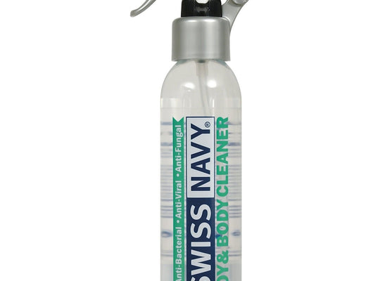 The Swiss Navy Toy & Body Cleaner - 6oz is a transparent spray bottle with a silver nozzle, boasting Anti-Bacterial, Anti-Viral, Anti-Fungal properties. Ideal as both a toy and body cleaner.