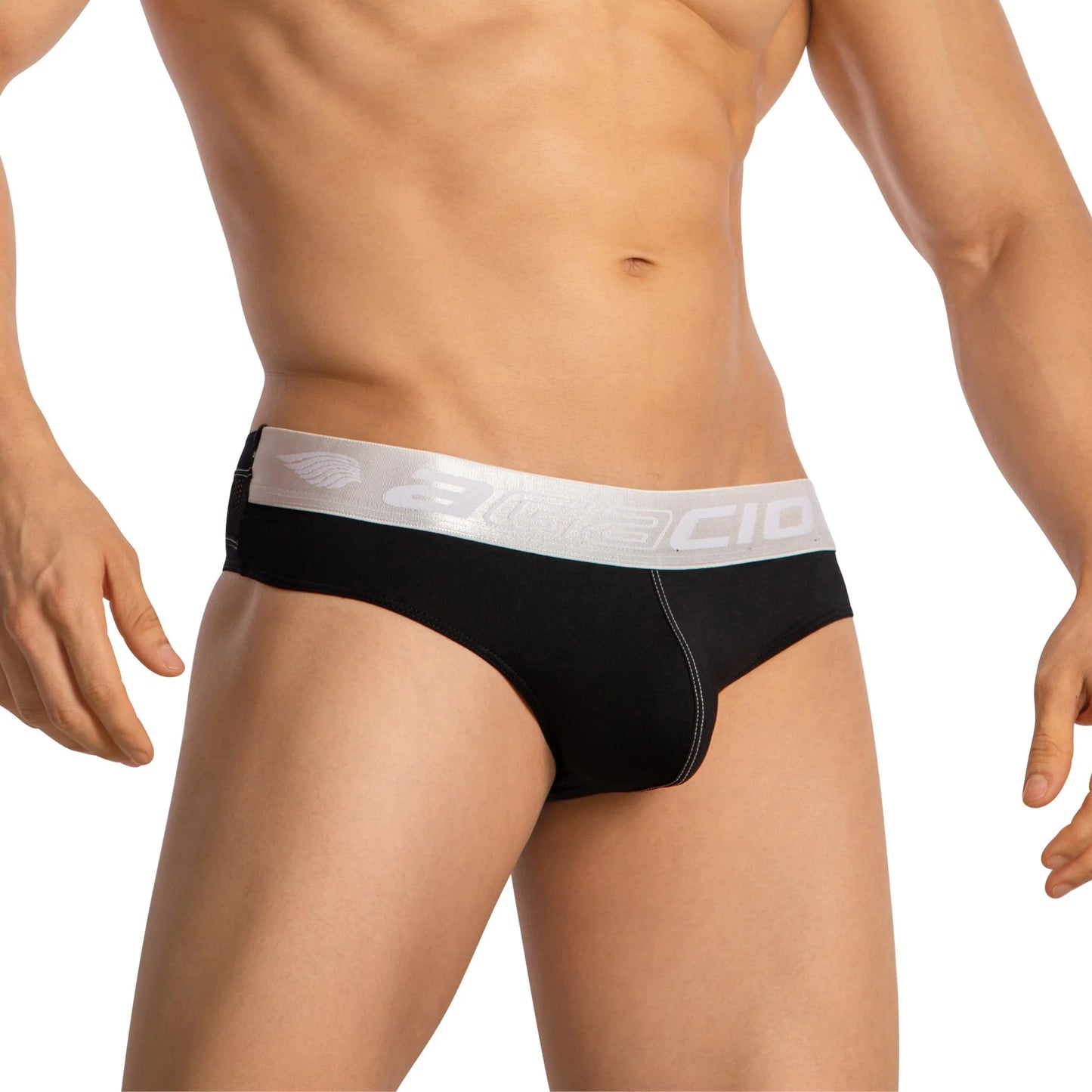 A sporty model showcases Agacio Thongs for Guys Sports Underwear, featuring black thongs with a silver logo waistband and a supportive contour pouch. The image is cropped from neck to thigh.