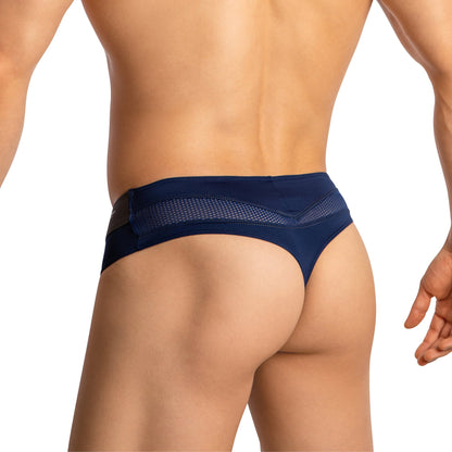 An individual models the sporty design of Agacio Thongs for Guys Sports Underwear. The dark blue thong features side mesh details, a supportive contour pouch, and a snug fit, perfectly blending style with comfort for those seeking athletic underwear.