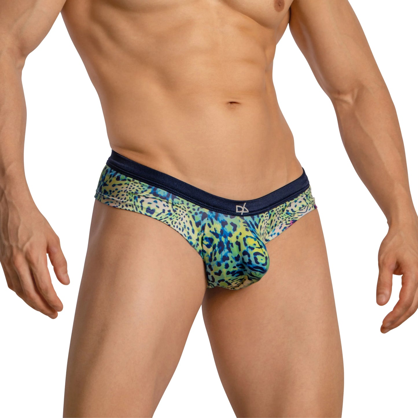 A male model wears Daniel Alexander Boxer Briefs with leopard print, featuring a black waistband and striking blue and green spots. The stretchy, body-hugging design partially reveals his upper body against a plain white background.