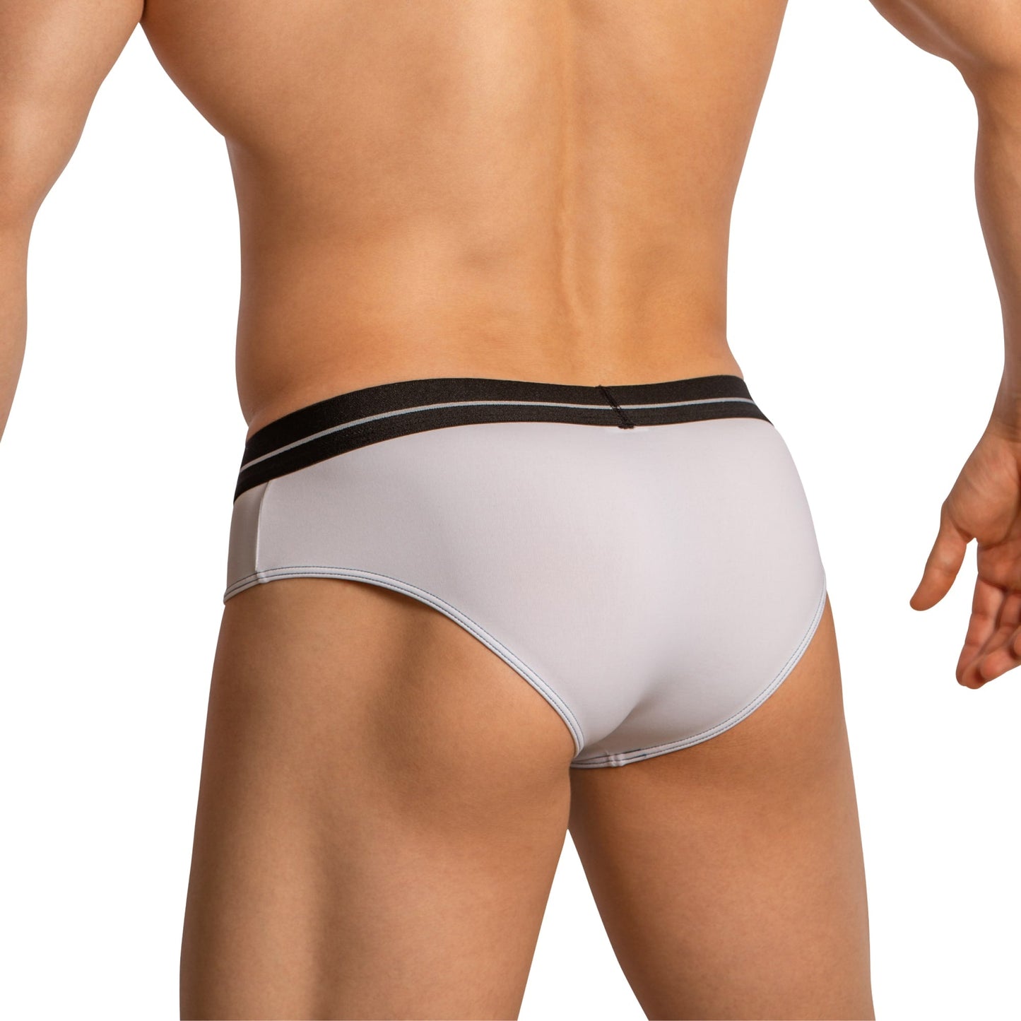 A muscular person in Feel Thongs for Men, featuring white briefs with a black waistband, is pictured from the back, slightly turned to the side, against a plain white background.