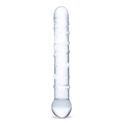 The Glas Callisto Glass Dildo, a handblown artisan-crafted piece by Glas, features a cylindrical form with a rounded base and showcases subtle raised patterns and textured designs along its length, set against a plain white background.