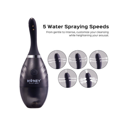 An image of the black Bulby Auto Spray Anal Douche System by Honey Play Box, showcasing its curved nozzle and five circular insets for adjustable spraying. Text reads: 5 Water Spraying Speeds: From gentle to intense, customize your cleansing while heightening your arousal.