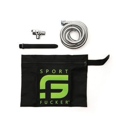 Items from the Sport Fucker Shower Kit, including a stainless-steel hose, black pouch with green SPORT logo, black cylindrical object, and metal valve fitting are displayed on a white background.