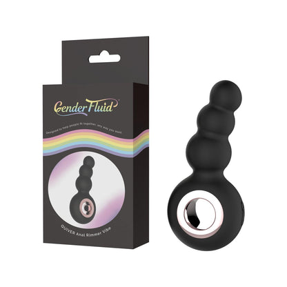 A black, medical grade silicone Gender Fluid Quiver Anal Ring Bead Vibe with a circular handle is shown by its packaging, featuring the Gender X brand, rainbow design, and the product name.