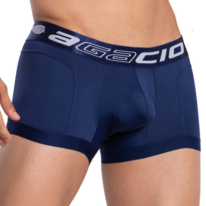 The image features a person from the waist down wearing Agacio Armor Boxer Trunk in blue. The brand name Agacio is emblazoned on the waistband, offering a stylish and comfortable look. The smooth, fitted fabric ensures an ideal mix of style and comfort.