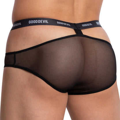 A person models the Good Devil Fathom Bikini, showcasing its seductive mesh pouch and branded waistband with Good Devil in white text. The focus is on the back view, highlighting the design features of this premium fabric blend garment.