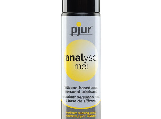 A 100 mL bottle of Pjur Analyze Me! Relaxing Anal Glide Silicone lube, in black and silver packaging, offers a German-made desensitizing formula with English and French text for enhanced comfort.