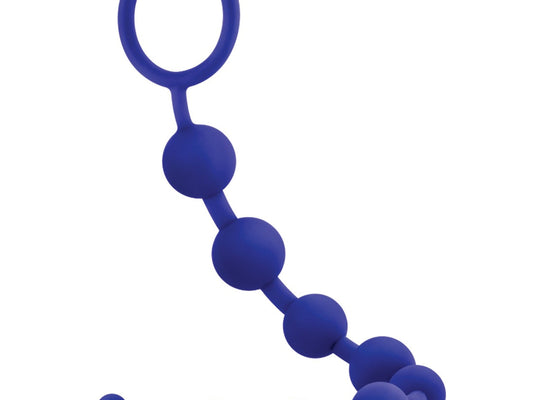 The Blush Luxe Silicone Beads by Blush Novelties are seamless blue anal beads made of body-safe silicone, featuring a curved, flexible strand with spherical beads that gradually increase in size and end with a ring handle for easy grip and control.