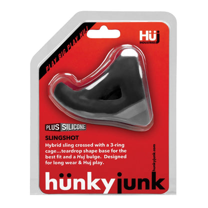 The Hunky Junk Slingshot 3 Ring Teardrop by Hunky Junk features a hybrid 3-ring cage with a teardrop base, made from plus+silicone for comfort during extended wear, and comes in striking red packaging.