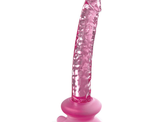 The Icicles No. 86 glass massager by Icicles, featuring a translucent pink finish, textured surface, and suction cup base, stands vertically against a white background to highlight its functionality and aesthetic appeal.
