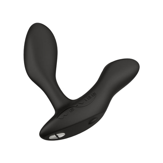 The We-Vibe Vector+ by we-vibe is a black, dual-end silicone product with a curved shaft and rounded arm. Boasting a sleek, ergonomic design, it includes a control button for easy use and enhanced performance.