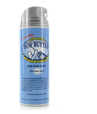 The Boy Butter Easy Pump - H2O is a latex-safe, water-based lube in a blue canister with pump top, featuring phrases like 100% Made in USA and Its Not Real Butter! Its packaging has light blue, white, and yellow accents.