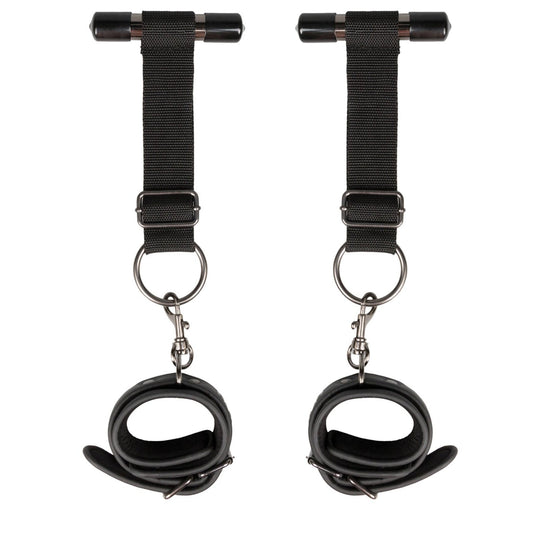 The Easy Toys Over The Door Wrist Cuffs by Easy Toys are black faux leather suspension cuffs with adjustable straps, metal clasps, padded interiors for comfort, and sturdy metal rings for secure hanging as bondage restraints.