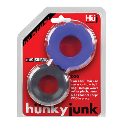 The Hunky Junk Cog Ring 2 Size Double Pack by Hunky Junk includes two stackable silicone c-rings, one blue and one black, made with a plus+silicone TPR/silicone blend that prevents rolling or pinching.