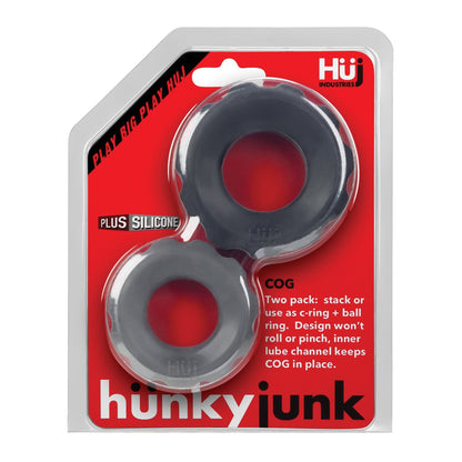 The Hunky Junk Cog Ring 2 Size Double Pack features two COG rings, made from a plus+silicone TPR/silicone blend. Designed to prevent rolling and pinching as c-rings or ball rings, their vibrant red and white packaging adds to the appeal with an innovative lube channel.