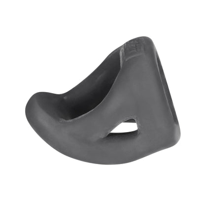 A black, contoured object from Hunky Junk with a smooth surface and angular design, featuring an open triangular side. Made of plus+silicone, it resembles the Hunky Junk Slingshot 3 Ring Teardrop handle or grip for a tool or device.