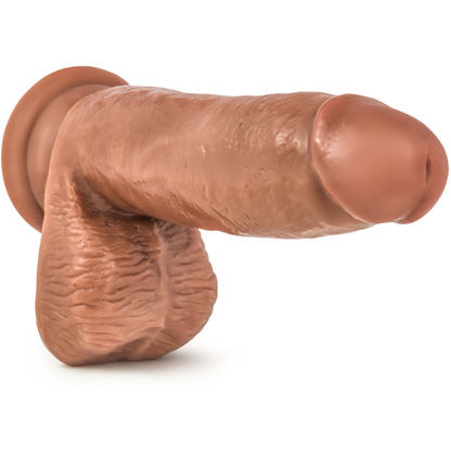 The Loverboy 5.5 Manny is a body-safe, flesh-toned silicone dildo with realistic veins and a secure suction cup base, crafted to mimic the human penis for an authentic experience.